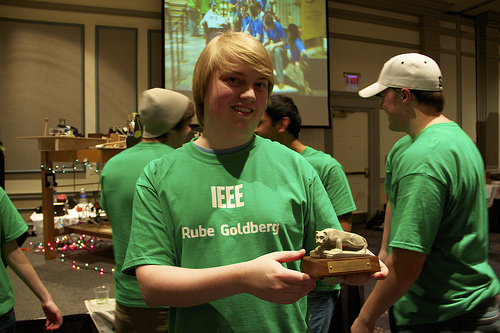 Rube Goldberg with trophy